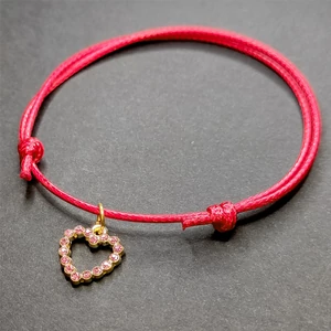 Kép 1/2 - Fekete-zsinórszövet-karkötő-pink-kristály-szív-charmmal