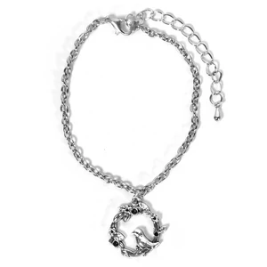 Kép 1/3 - madarka-charm-karkoto-arany-vagy-ezust-szinben
