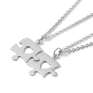 Kép 1/4 - rozsdamentas-acel-paros-puzzle-medal-nyaklanccal